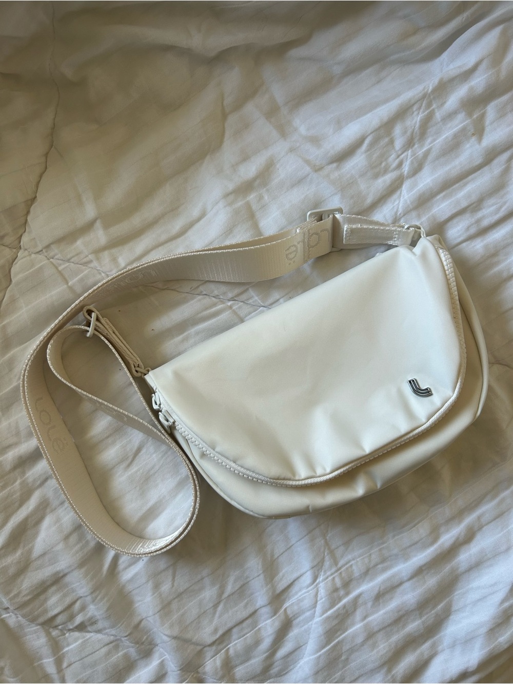 Lolë creamy white shoulder zip bag, fanny pack, purse, shoulder bag